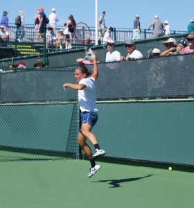tennis player jumping